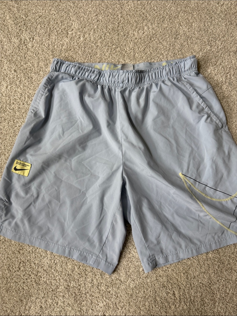 Nike Light Blue Men's Athletic Shorts with Yellow Accents (large)